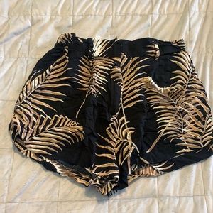 Black and gold palm print shorts size 8